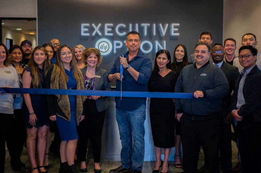 Executive Option team at their ribbon cutting event