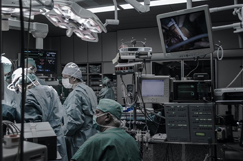 Surgeons working in an operating room
